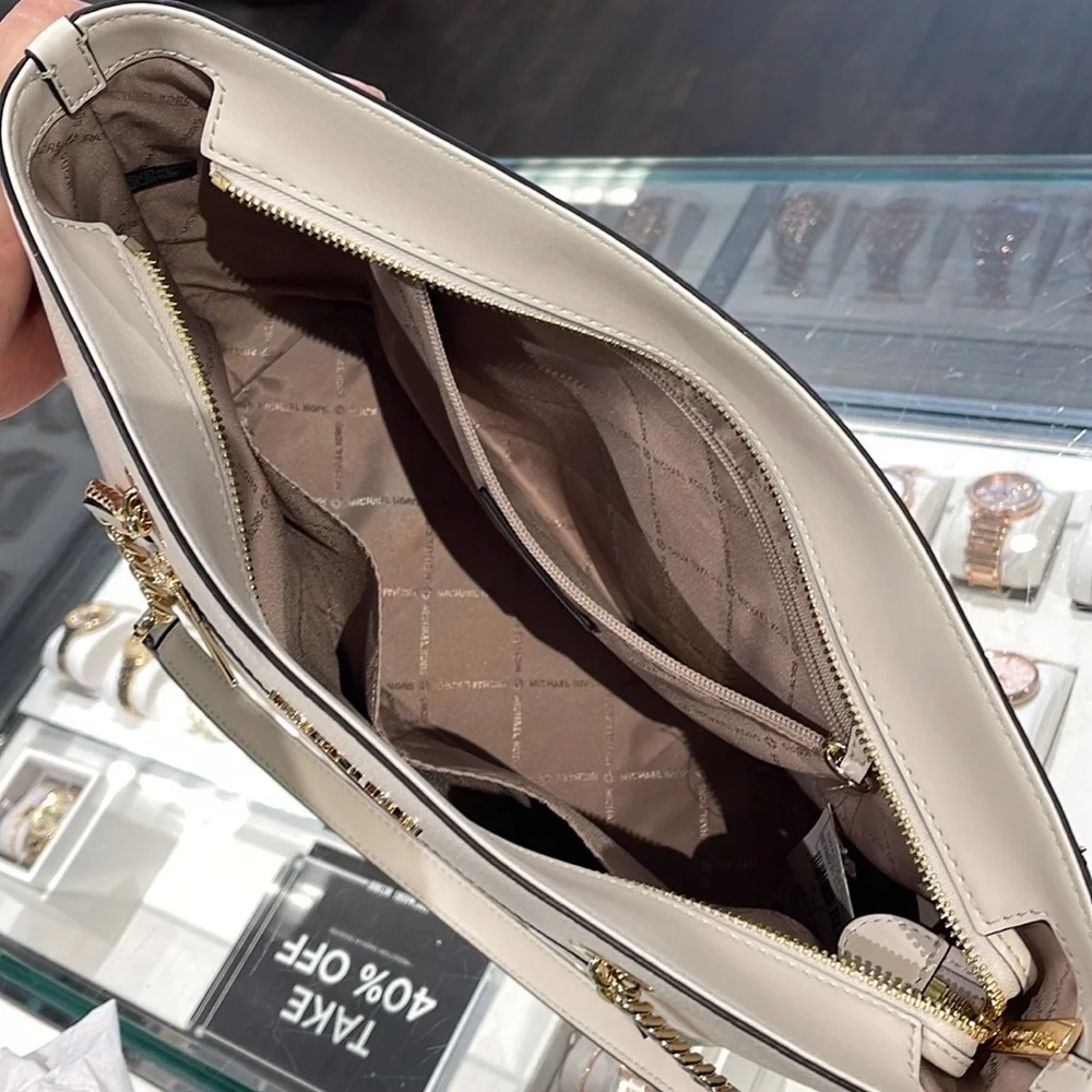 MICHAEL KORS
Jet Set Medium Front Zip Pebbled Leather Chain Tote Bag
Light Cream - Picture 8 of 16